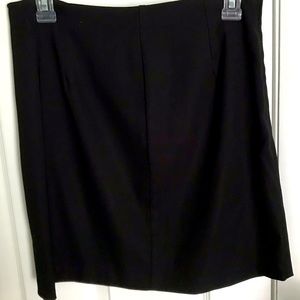 Alyn Paige straight black mini skirt zippered back